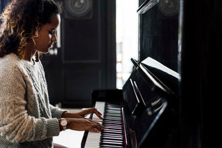 Woman playing on a piano